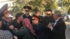 Kazakhstan - The police is attempting to take the activist to the courtroom. Shymkent, 25 October 2019 